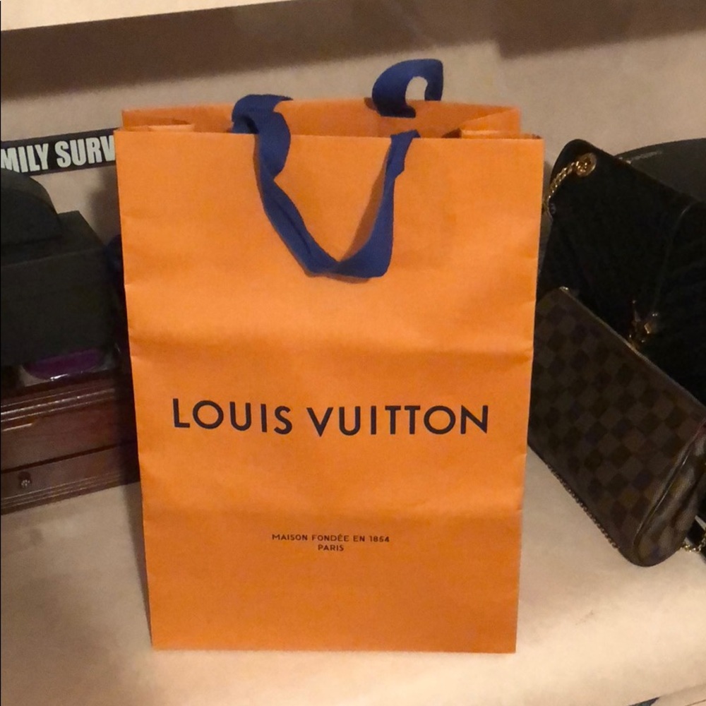 Tall Louis Vuitton shopping bag